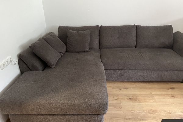 Ecksofa mit Schlaffunktion und Bettkasten